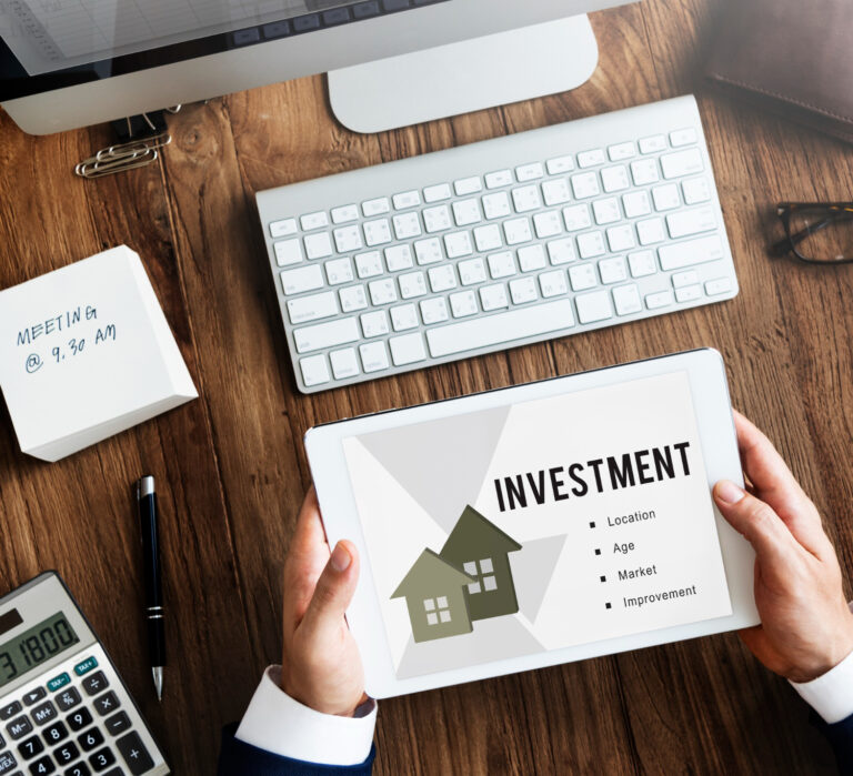Should I sell my investment property - investor reviewing property investment factors