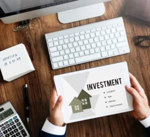 Should I sell my investment property - investor reviewing property investment factors
